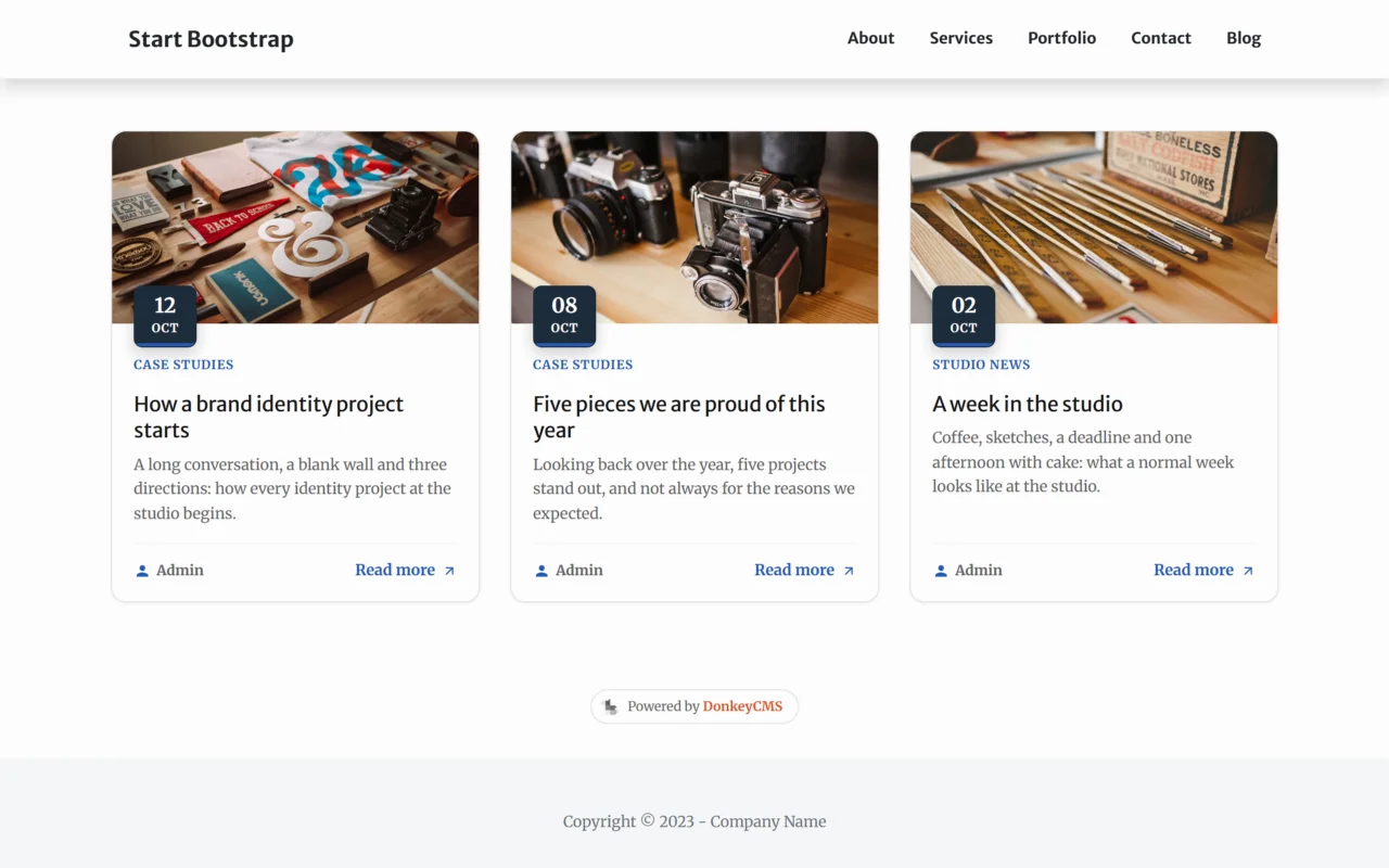 The finished Creative blog: the template's own menu and footer around three example studio posts.
